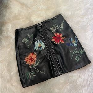 Faux leather embroidered and studded black mini skirt